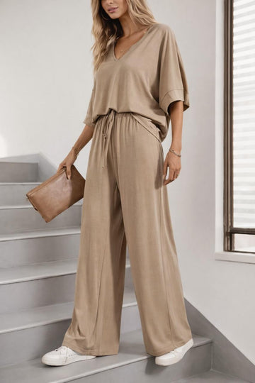 0000 Skin V-Neck Baggie Style Down Should Half Sleeves With Matching Plazzo Style Loose Trouser.