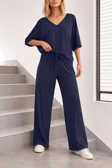 0000 Navy Blue V-Neck Baggie Style Down Should Half Sleeves With Matching Plazzo Style Loose Trouser.